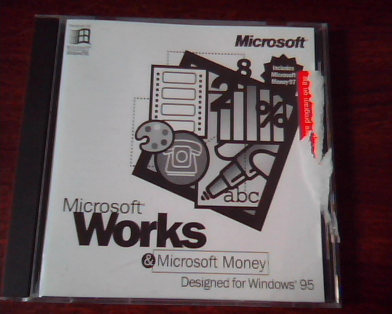 CD Microsoft Works and Money Windows 95 000-58910 in case